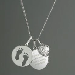 Personalised Sterling Silver Footprints And Cubic Zirconia Heart Necklace