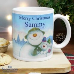 Personalised The Snowman And The Snowdog Mug